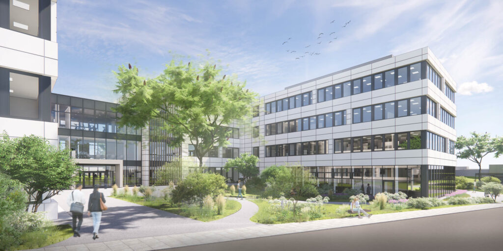 Goldbeck erweitert seinen Standort in Treuen: Eine neue Produktionshalle wurde bereits im Juli fertiggestellt. Bis Herbst 2024 entsteht ein neues Bürogebäude. Visualisierung: Goldbeck